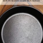 Overhead view of a cast iron skillet on a wood cutting board