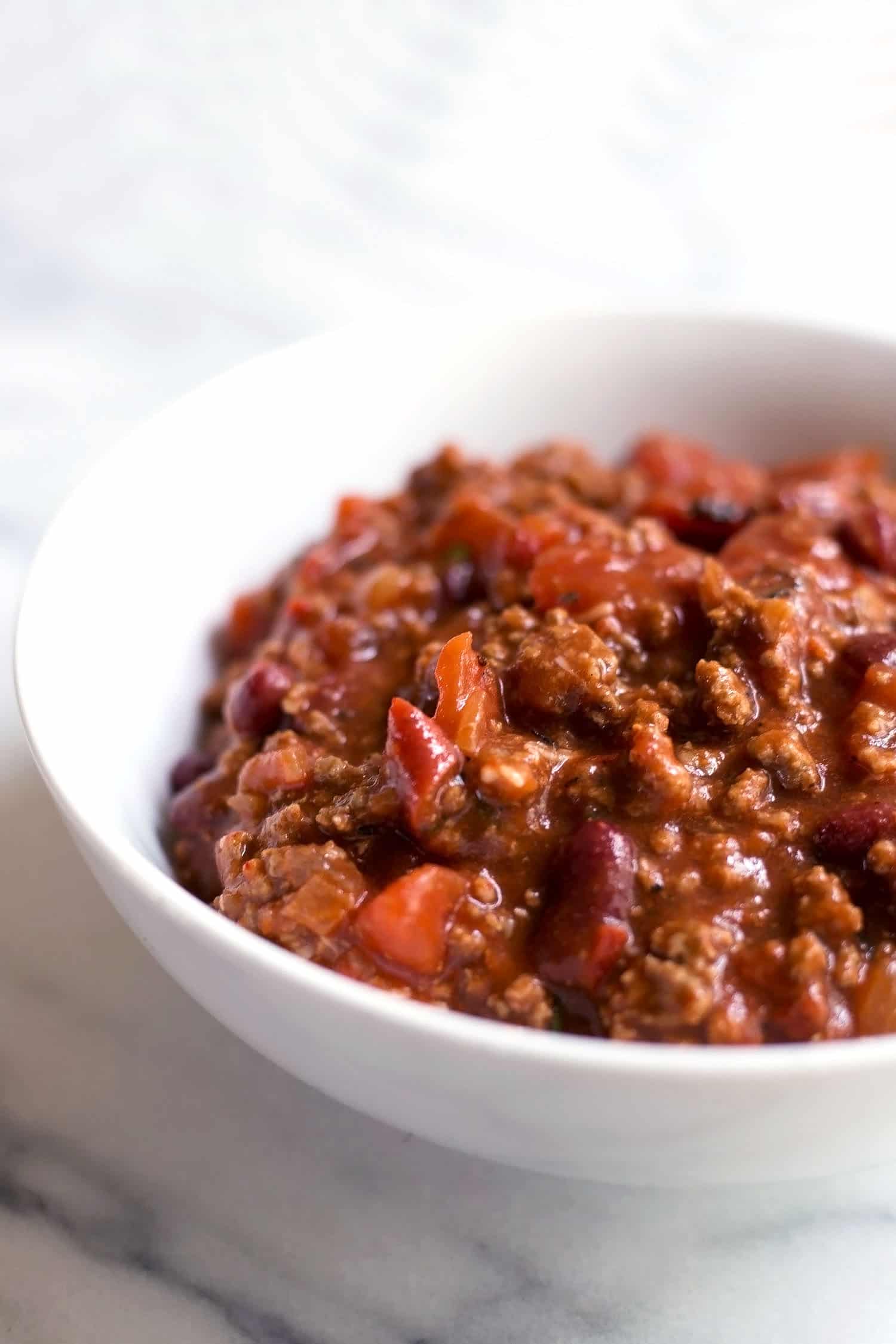A white bowl of beef chili