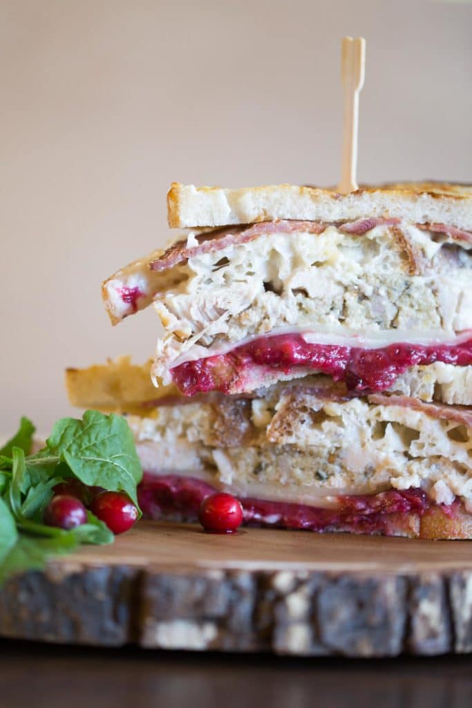 Toasted turkey sandwich cut in half and stacked