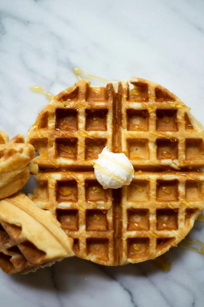 Belgian waffle with mascarpone cheese and maple syrup