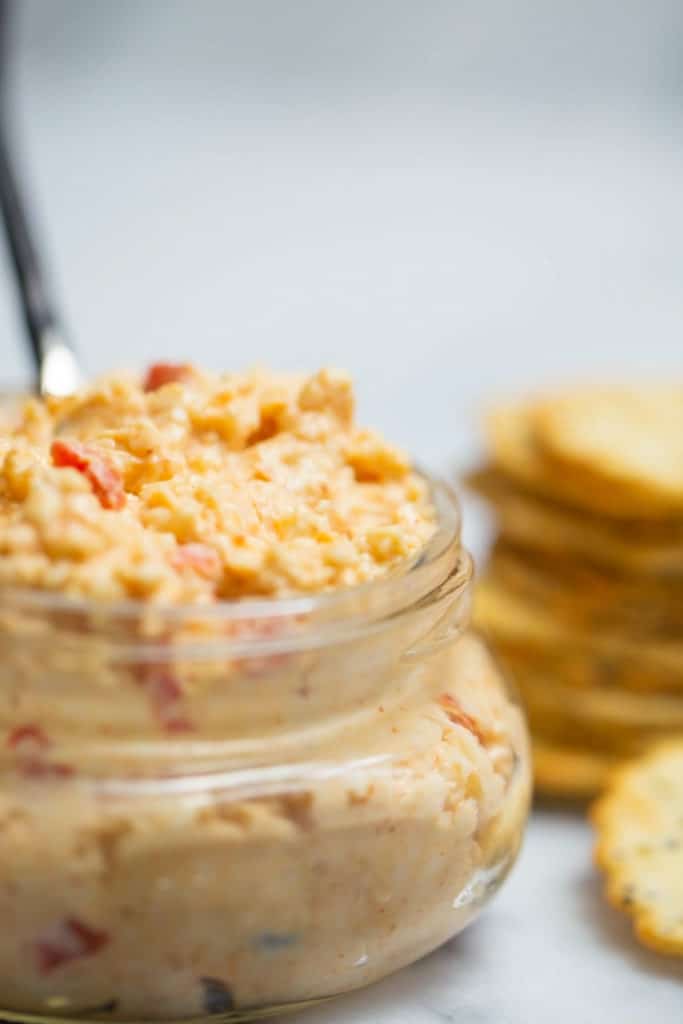 Clear jar of pimento cheese 