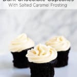 Three dark chocolate cupcakes with salted caramel frosting