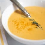 White bowl of lobster bisque