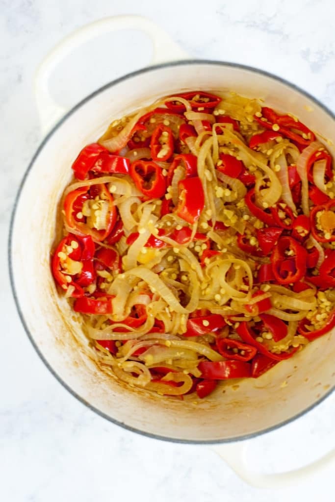 Pan of cooked onions and peppers