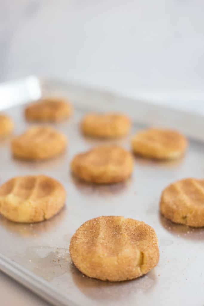 A baking sheet with unbaked cookies